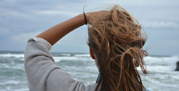 tousled hair on the beach